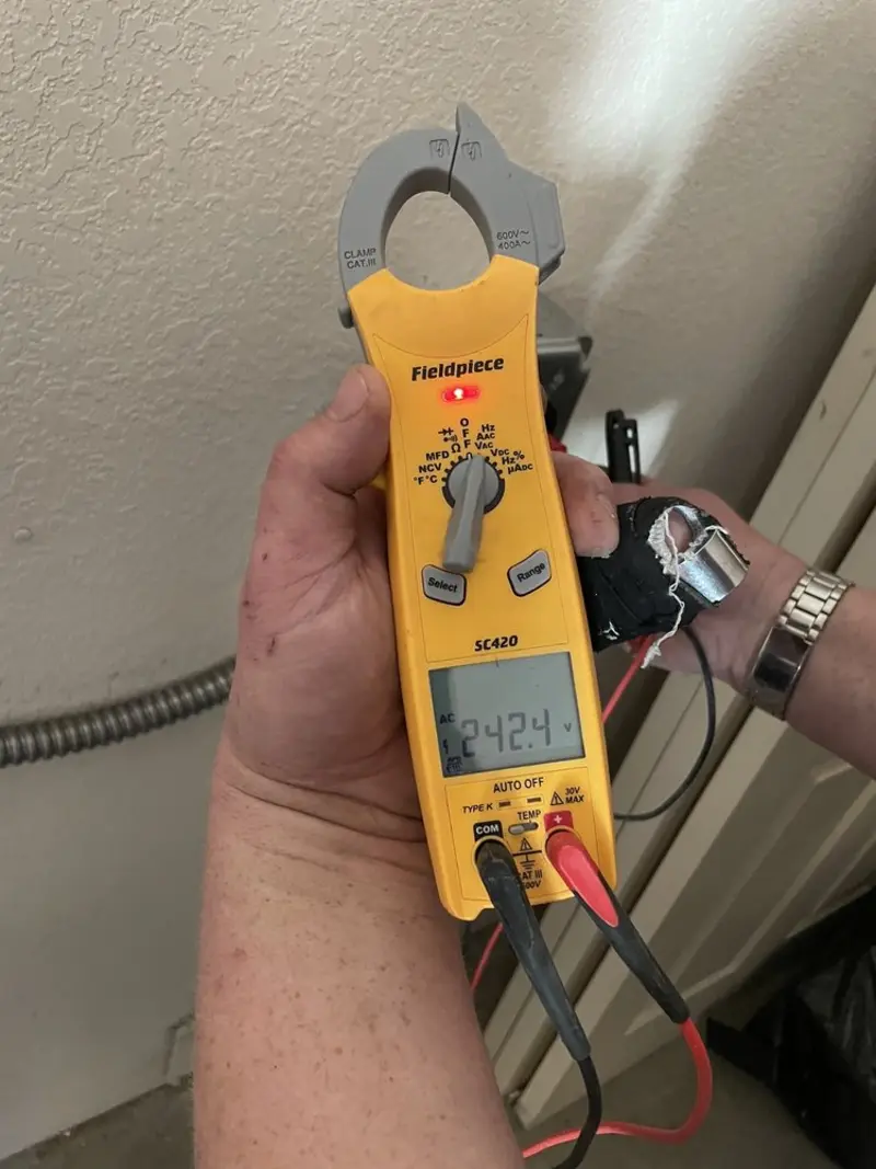 Voltage testing with clamp meter during Whole House Surge Protector in Robbinsville